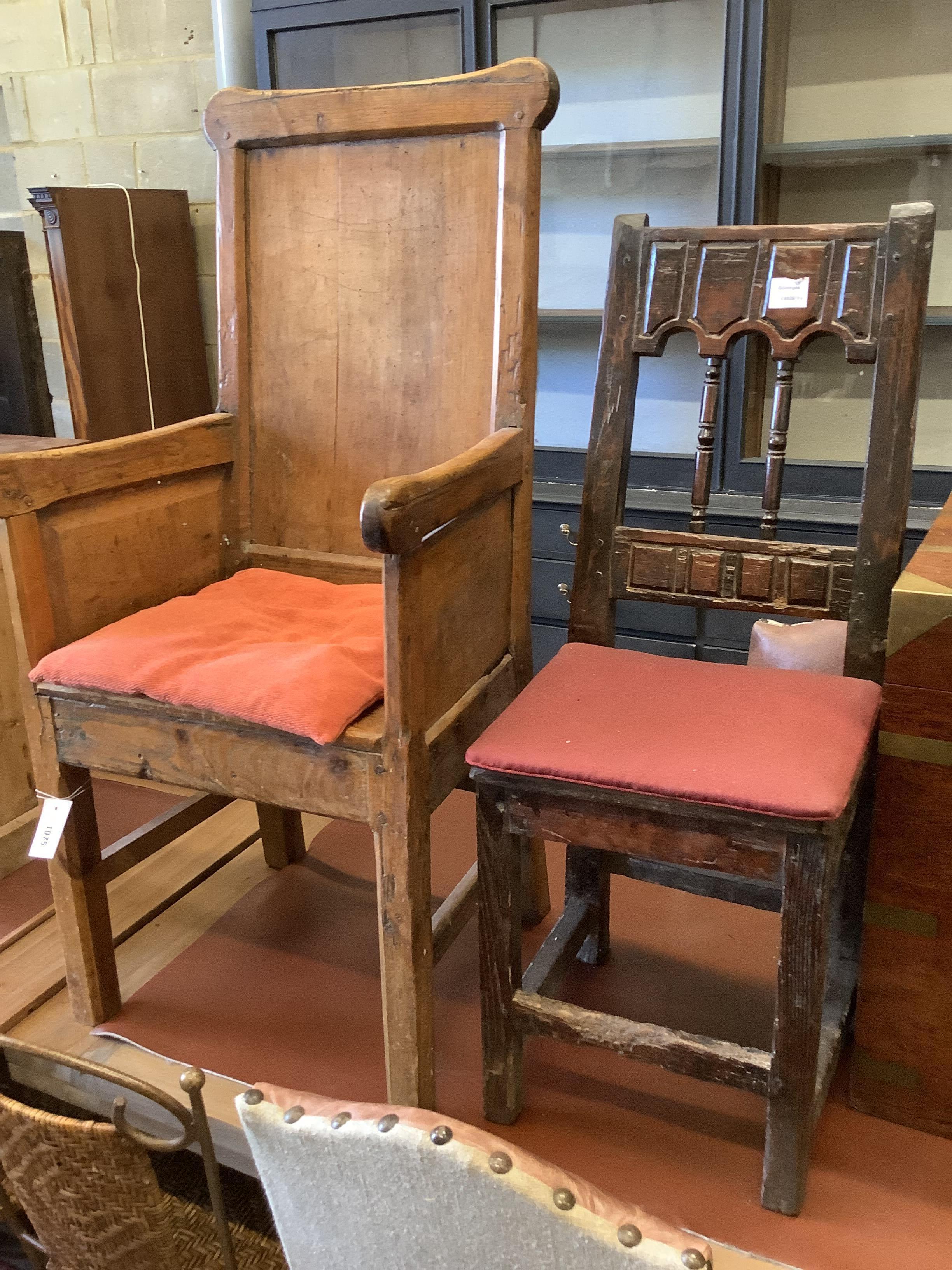 An 18th century stripped pine armchair and a dining chair